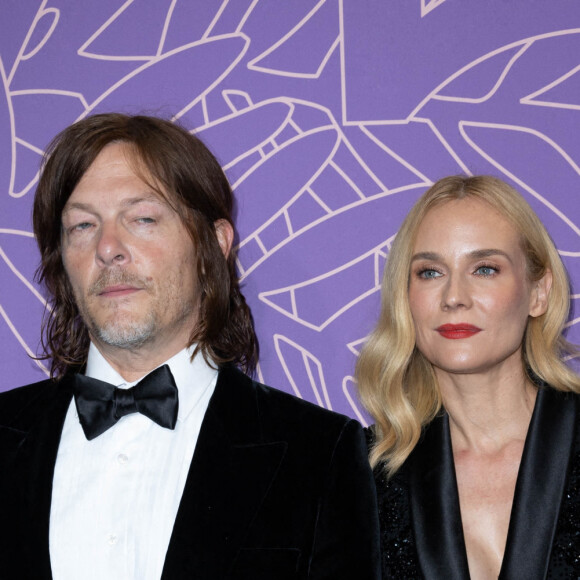 Norman Reedus et sa compagne Diane Kruger - Photocall du dîner du 75ème Festival International du Film de Cannes. Le 24 mai 2022