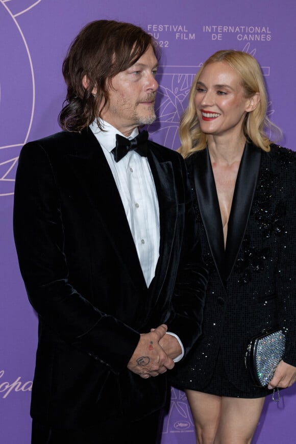 Norman Reedus et sa compagne Diane Kruger - Photocall du dîner du 75ème Festival International du Film de Cannes. Le 24 mai 2022