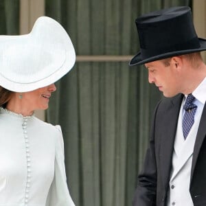 Le prince William, duc de Cambridge, et Catherine (Kate) Middleton, duchesse de Cambridge, lors d'une Royal Garden Party au Buckingham Palace à Londres, Royaume Uni, le 25 mai 2022. 