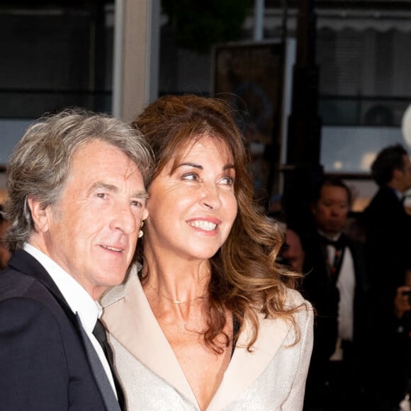 François Cluzet et sa femme Narjiss Slaoui-Falcoz - Montée des marches du film " Mascarade " lors du 75ème Festival International du Film de Cannes. Le 27 mai 2022 © Cyril Moreau / Bestimage 