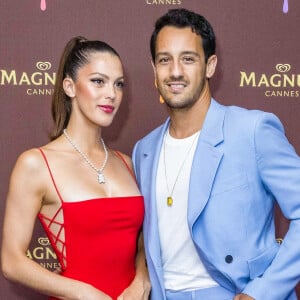 Iris Mittenaere (Miss France 2016) et son compagnon Diego El Glaoui au photocall de la soirée "Magnum" lors du 75ème Festival International du Film de Cannes le 19 mai 2022.© Jack Tribeca / Bestimage