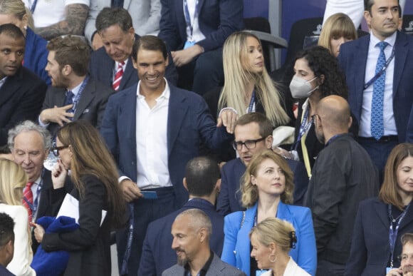 Rafael Nadal et sa femme Xisca Perello - Les célébrités assistent à la victoire du Real Madrid face à Liverpool (1-0) en finale de la Ligue des Champions au stade de France, le 28 mai 2022. © Cyril Moreau / Bestimage