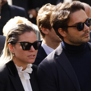 Sophie Tapie (Fille du défunt) et son mari Jean-Mathieu Marinetti - Sorties de la messe funéraire en hommage à Bernard Tapie en l'église Saint-Germain-des-Prés à Paris. Le 6 octobre 2021 © Jacovides-Moreau / Bestimage