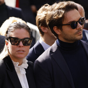 Sophie Tapie (Fille du défunt) et son mari Jean-Mathieu Marinetti - Sorties de la messe funéraire en hommage à Bernard Tapie en l'église Saint-Germain-des-Prés à Paris. Le 6 octobre 2021 © Jacovides-Moreau / Bestimage  