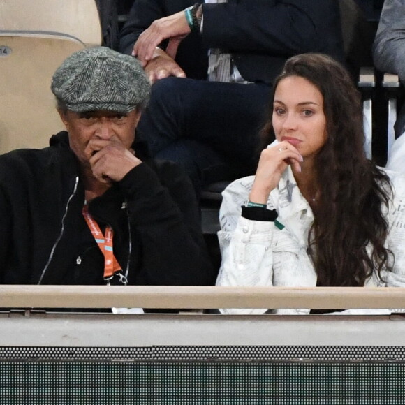 Yannick Noah et sa fille Jenaye Noah - Célébrités dans les tribunes des internationaux de France de Roland Garros à Paris.