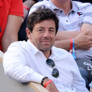 Patrick Bruel et son fils Léon - Célébrités dans les tribunes des internationaux de France de Roland Garros à Paris le 31 mai 2022. © Cyril Moreau - Dominique Jacovides/Bestimage 