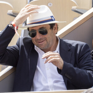 Patrick Bruel - Célébrités dans les tribunes des internationaux de France de Roland Garros à Paris. © Cyril Moreau - Dominique Jacovides/Bestimage 