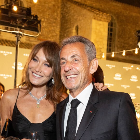 Carla Bruni et son mari Nicolas Sarkozy - Personnalités à la soirée "Women In Motion" par Kering au Château de la Castre lors du 75ème Festival International du Film de Cannes. Le 22 mai 2022 © Olivier Borde / Bestimage 