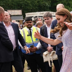 Le prince William, duc de Cambridge, et Catherine (Kate) Middleton, duchesse de Cambridge, lors d'une visite à la toute première journée du comté de Cambridgeshire à l'hippodrome July à Newmarket, Royaume Uni, le 23 juin 2022. 