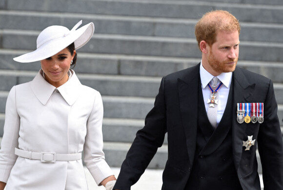 Le prince Harry, duc de Sussex, et Meghan Markle, duchesse de Sussex lors de la messe célébrée à la cathédrale Saint-Paul de Londres, dans le cadre du jubilé de platine (70 ans de règne) de la reine Elisabeth II d'Angleterre. Londres, le 3 juin 2022. 
