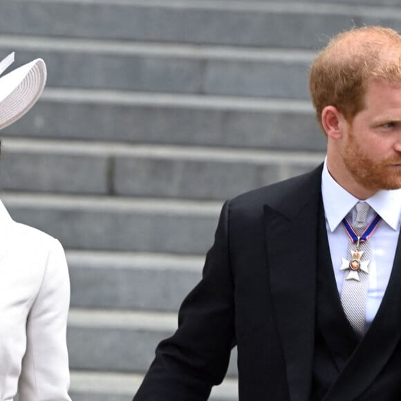 Le prince Harry, duc de Sussex, et Meghan Markle, duchesse de Sussex lors de la messe célébrée à la cathédrale Saint-Paul de Londres, dans le cadre du jubilé de platine (70 ans de règne) de la reine Elisabeth II d'Angleterre. Londres, le 3 juin 2022. 