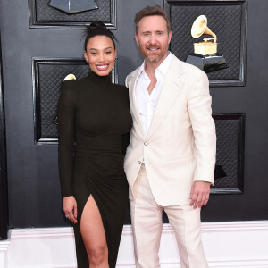 David Guetta et sa compagne Jessica - 64e édition des Grammy Awards au MGM Grand Garden à Las Vegas, le 3 avril 2022.