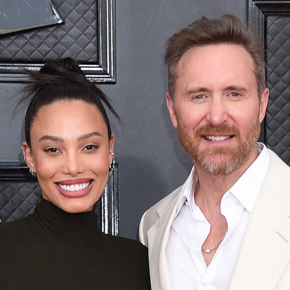 David Guetta et sa compagne Jessica - 64e édition des Grammy Awards au MGM Grand Garden à Las Vegas, le 3 avril 2022.