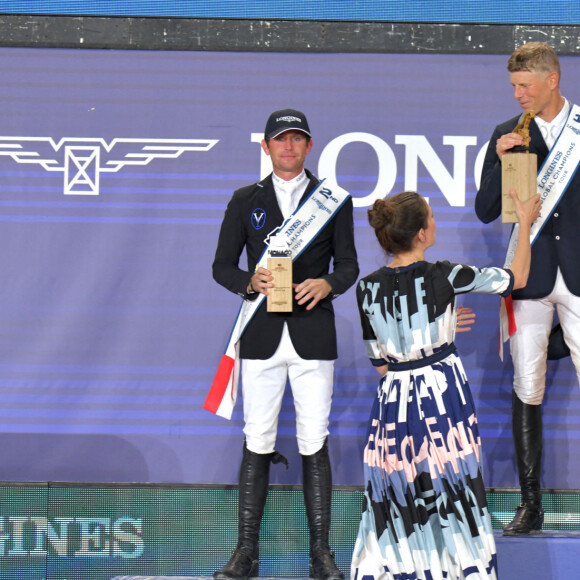 Charlotte Casiraghi félicite Max Kuhner durant le Jumping International de Monaco, 16eme édition du Longines Global Champions Tour, le 2 juillet 2022. Le prix du Prince Souverain lors de la dernière journée de la compétition a été remis sur le port Hercule à Monaco. C'est le cavalier autrichien Max Kuhner qui a terminé premier, suivi par l'irlandais Darragh Kenny et du belge Olivier Philippaerts