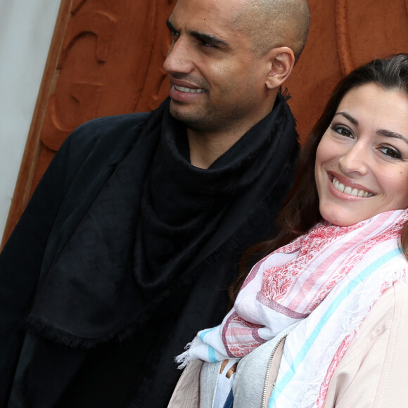 Aurélien Capoue et sa femme Rachel Legrain-Trapani - People au village des Internationaux de France de tennis de Roland Garros à Paris, le 28 mai 2014.