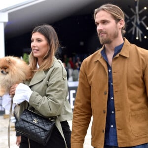 Camille Cerf (Miss France 2015 et Ambassadrice du LGCT-LPEJ 2022), son compagnon Théo Fleury et le chien Romeo - 8ème édition du "Longines Paris Eiffel Jumping" au Champ de Mars à Paris, le 25 juin 2022. © Perusseau/Gorassini/Tribeca/Bestimage 