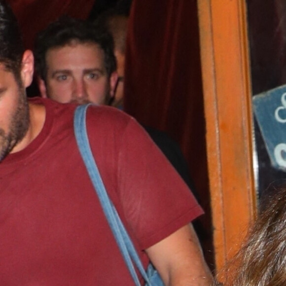 Harry Styles et a compagne Olivia Wilde sortent du restaurant Rubirosa à New York le 18 août 2022.