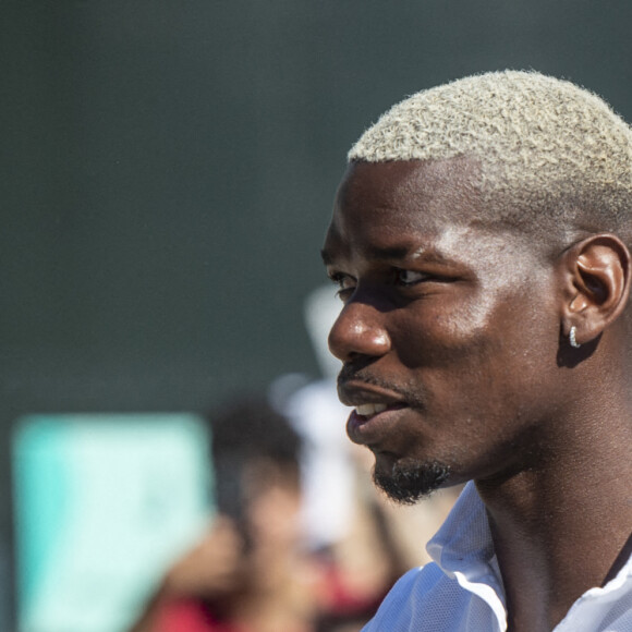 Paul Pogba arrive dans un centre médical de Turin avant de jouer avec la Juventus le 9 juillet 2022. 