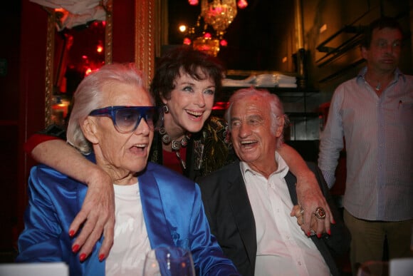 Anny Duperey et Jean-Paul Belmondo - Michou fête son 88e anniversaire dans son cabaret avec ses amis à Paris le 18 juin 2019. © JLPPA/Bestimage