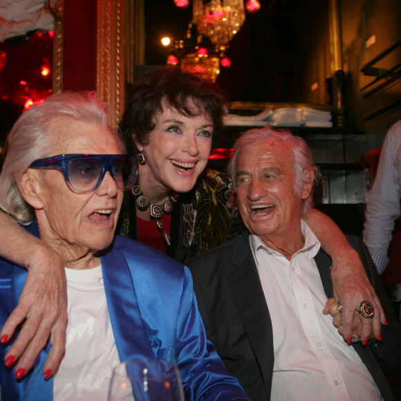Anny Duperey et Jean-Paul Belmondo - Michou fête son 88e anniversaire dans son cabaret avec ses amis à Paris le 18 juin 2019. © JLPPA/Bestimage