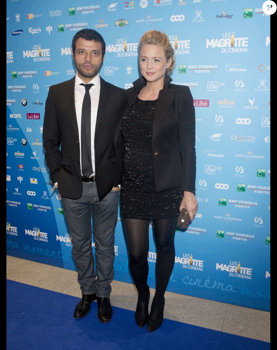Virginie Efira enceinte (pochette de caroline de Marchi) et son compagnon Mabrouk El Mechri - 3eme Ceremonie des "Magritte du cinema 2013" a Bruxelles en Belgique.