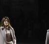 Naomi Campbell et Carla Bruni-Sarkozy défilent sur le podium du défilé de mode Tod's Prêt-à-porter printemps/été 2023 lors de la Fashion Week de Milan, Italie, le 23 septembre 2022. 