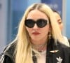 Madonna et son fils David Banda, 16 ans, arrivent à l'aéroport JFK à New York, le 11 août 2022. 