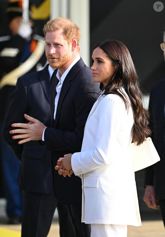 Le prince Harry, duc de Sussex, et Meghan Markle, duchesse de Sussex assistent à un engagement à la veille des Jeux Invictus 2020 aux Pays-Bas, à La Haye, le 15 avril 2022. 