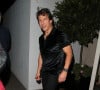 Tom Cruise à la sortie de l'hôtel "Dorchester" à Londres, le 19 juillet 2022. 
