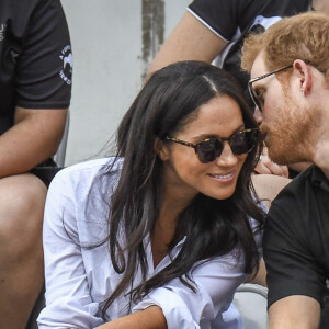 Première apparition officielle du prince Harry et sa compagne Meghan Markle dans les tribunes de la finale de tennis à la troisième édition des Invictus Games à Toronto, Ontario, Canada, le 25 septembre 2017. 