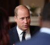 Le prince William, prince de Galles, rencontre des bénévoles et du personnel opérationnel au Windsor Guildhall à Windsor, Royaume Uni, le 22 septembre 2022, afin de les remercier de leur implication dlors des funérailles de la La reine Elisabeth II au château de Windsor. 
