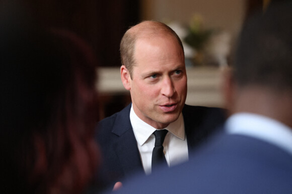Le prince William, prince de Galles, rencontre des bénévoles et du personnel opérationnel au Windsor Guildhall à Windsor, Royaume Uni, le 22 septembre 2022, afin de les remercier de leur implication dlors des funérailles de la La reine Elisabeth II au château de Windsor. 