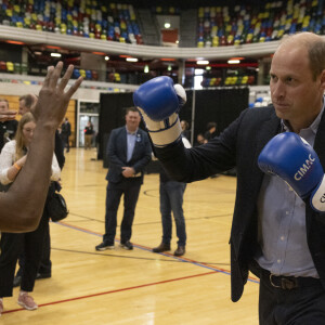 Le prince William, prince de Galles, visite la Copper Box Arena du Queen Elizabeth Olympic Park, pour participer à un événement avec Coach Core, qui fête ses 10 ans, à Londres, Royaume Uni, le 13 octobre 2022. 