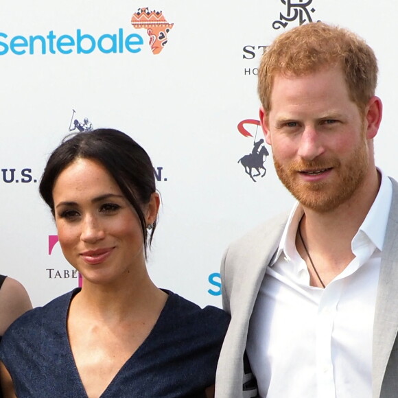 Le prince Harry, duc de Sussex et Meghan Markle, la Duchesse de Sussex arrivent à la Royal Berkshire Polo Cup où le Duc participe aujourd'hui à la Coupe ISP Hanz de Sentebale à Windsor au Royaume-Uni, le 26 juillet 2018. 