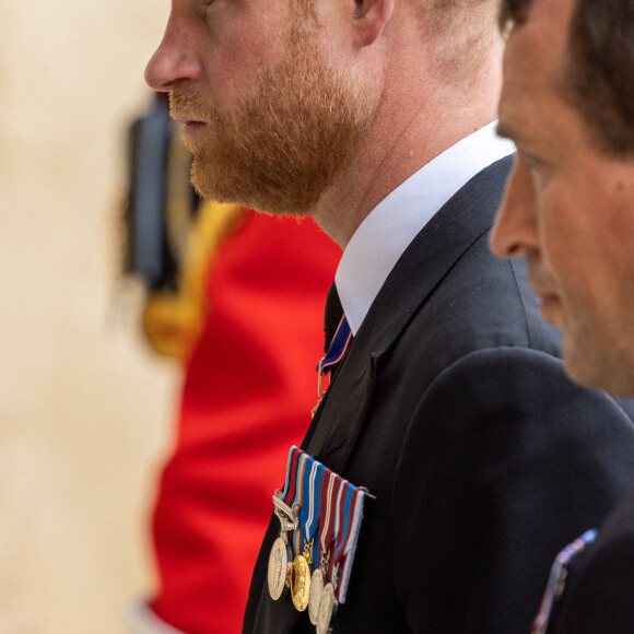 Le prince Harry, duc de Sussex - Procession pédestre des membres de la famille royale depuis la grande cour du château de Windsor (le Quadrangle) jusqu'à la Chapelle Saint-Georges, où se tiendra la cérémonie funèbre des funérailles d'Etat de reine Elizabeth II d'Angleterre. Windsor, le 19 septembre 2022 