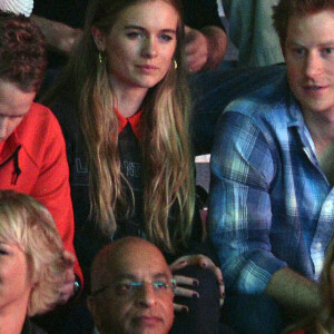 Sam Branson, le prince Harry d'Angleterre et sa compagne Cressida Bonas au "We Day UK" au Wembley Arena à Londres, le 7 mars 2014. 