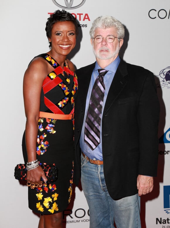 George Lucas et sa femme Mellody Hobson lors de la soirée "2014 Ebony Power 100 List" à Hollywood, le 19 novembre 2014.