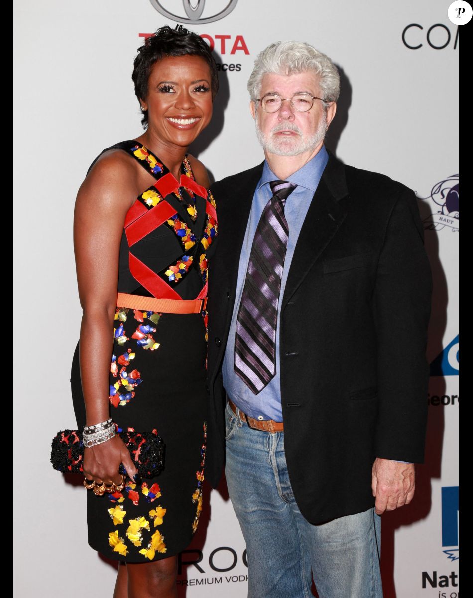 George Lucas et sa femme Mellody Hobson lors de la soirée "2014 Ebony Power 100 List" à Hollywood, le 19 novembre 2014.