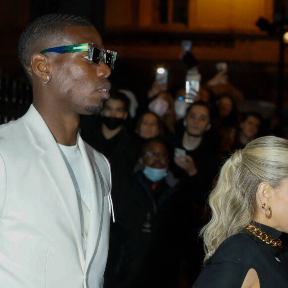 Paul Pogba et sa femme Maria Zulay Salaues - Arrivées et sorties du défilé Off-White Femme Automne/hiver 2022/2023 au palais Brongniart à Paris, France, le 28 février 2022. © Veeren-Christophe Clovis / Bestimage