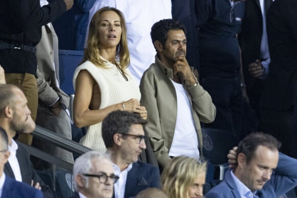 Mélissa Theuriau et son mari Jamel Debbouze au match aller de la Ligue des Champions entre le Paris Saint-Germain et la Juventus (2-1) au Parc des Princes à Paris le 6 septembre 2022.