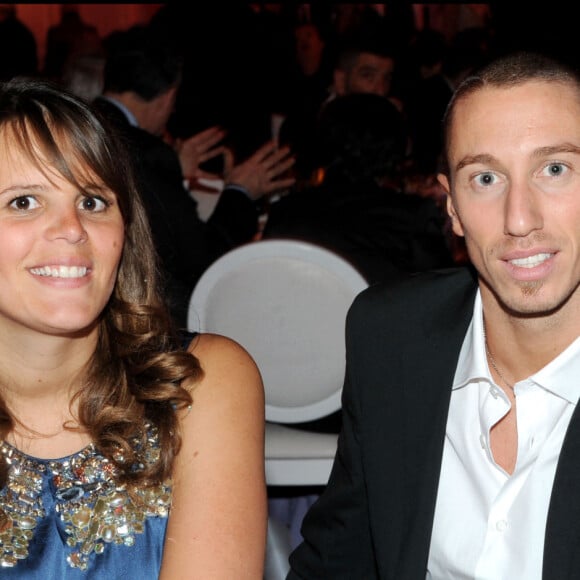 Laure Manaudou et Frédérick Bousquet en 2010 au dîner de la mode contre le Sida à Paris