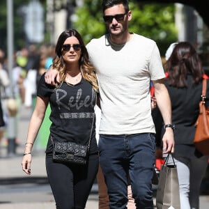 Exclusif - Le footballeur Hugo Lloris se remet de la défaite de l'Equipe de France face à la Belgique (3-4) en faisant une petite après-midi shopping avenue Montaigne avec son épouse Marine.