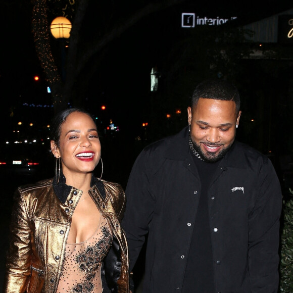 Christina Milian et J. Ryan La Cour à la sortie du "Harlowe Bar" à Los Angeles, le 19 décembre 2022.  Christina Milian and BFF Pretty Little Things Boss, J. Ryan La Cour were seen leaving the Harlowe Bar in West Hollywood. 