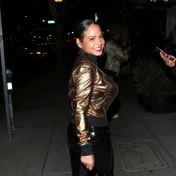 Christina Milian et J. Ryan La Cour à la sortie du "Harlowe Bar" à Los Angeles, le 19 décembre 2022.  Christina Milian and BFF Pretty Little Things Boss, J. Ryan La Cour were seen leaving the Harlowe Bar in West Hollywood. 