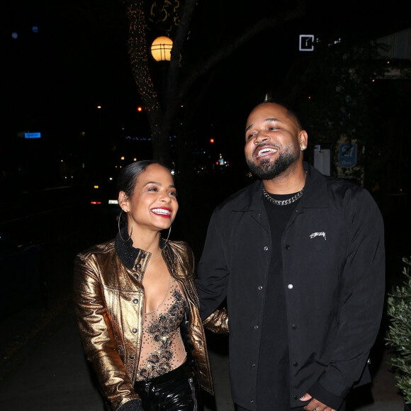 Christina Milian et J. Ryan La Cour à la sortie du "Harlowe Bar" à Los Angeles, le 19 décembre 2022.  Christina Milian and BFF Pretty Little Things Boss, J. Ryan La Cour were seen leaving the Harlowe Bar in West Hollywood. 