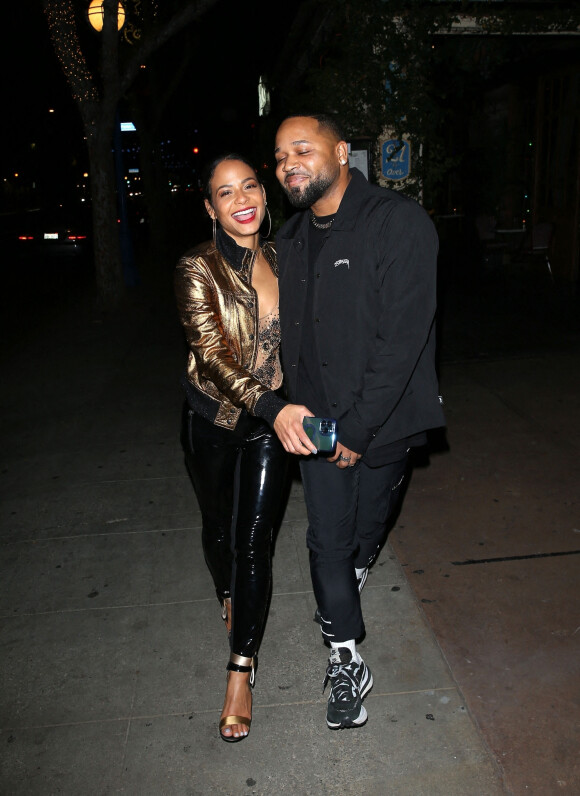 Christina Milian et J. Ryan La Cour à la sortie du "Harlowe Bar" à Los Angeles, le 19 décembre 2022.  Christina Milian and BFF Pretty Little Things Boss, J. Ryan La Cour were seen leaving the Harlowe Bar in West Hollywood. 