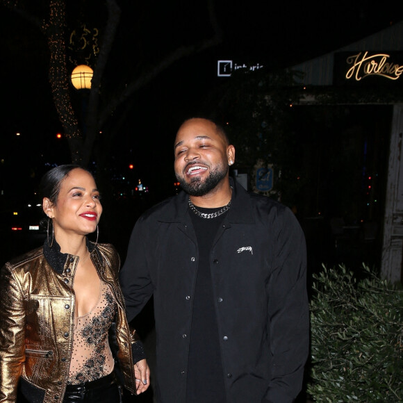 Christina Milian et J. Ryan La Cour à la sortie du "Harlowe Bar" à Los Angeles, le 19 décembre 2022.  Christina Milian and BFF Pretty Little Things Boss, J. Ryan La Cour were seen leaving the Harlowe Bar in West Hollywood. 