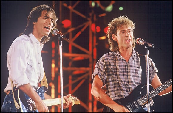 Jean-Jacques Goldman en concert en 1987 avec Michael Jones.