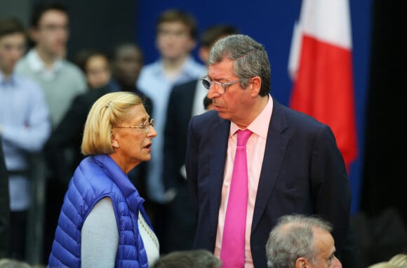 Patrick et Isabelle Balkany assistent au meeting de Nicolas Sarkozy à Boulogne-Billancourt le 25 novembre 2014.