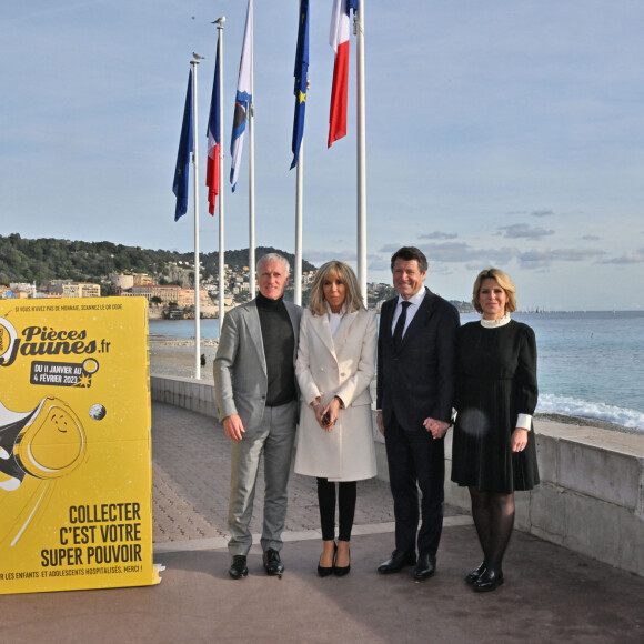 Le sélectionneur de l'équipe de France de football, Didier Deschamps (parrain de l'opération Pièces Jaunes), la Première dame française, Brigitte Macron (présidente de la Fondation Hôpitaux de Paris-Hôpitaux de France), le maire de Nice, Christian Estrosi et sa femme Laura Tenoudji - Lancement de l'édition 2023 de l'opération de collecte de fonds "Pièces Jaunes", destinée à à améliorer la vie des enfants hospitalisés, au Jardin Albert 1er, à Nice, France, le 11 janvier 2023. © Bruno Bebert/Bestimage 